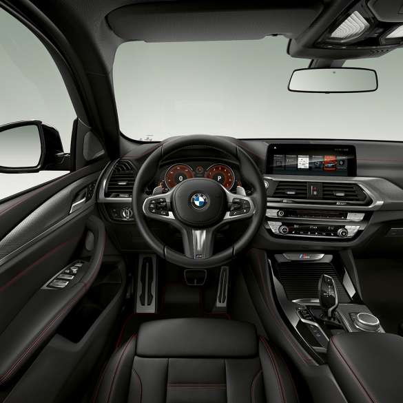BMW X4 M40i і BMW X4 M40d, кабіна. BMW X4 M40i і BMW X4 M40d, салон, кабіна зі шкіряним рульовим колесом M і сидіннями M Sport.