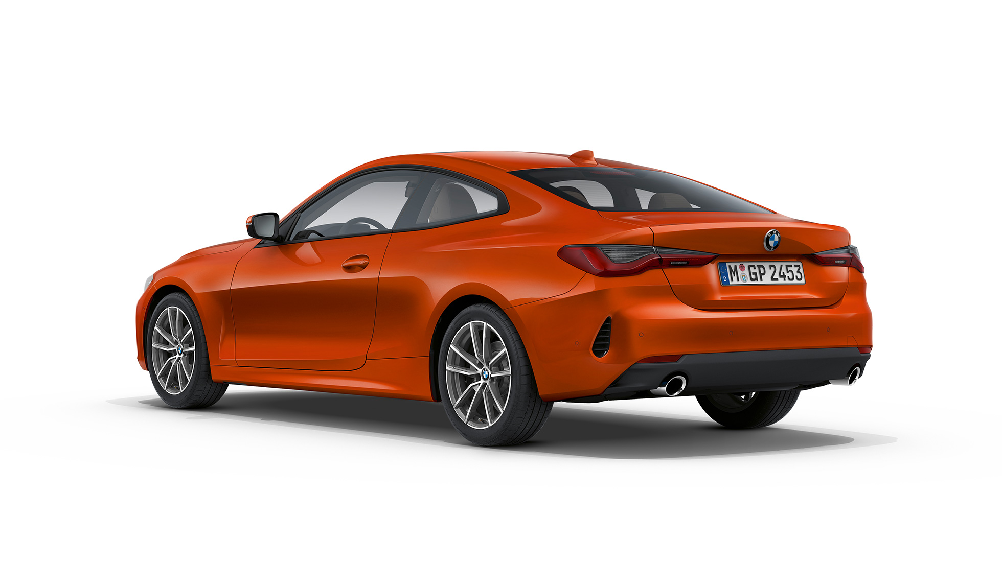 Вид ззаду з поворотом в три чверті BMW 4 серії Coupé G22 2020 BMW 4 серії Coupé G22 2020 Базова комплектація Sunset Orange металік вид ззаду з поворотом в три чверті