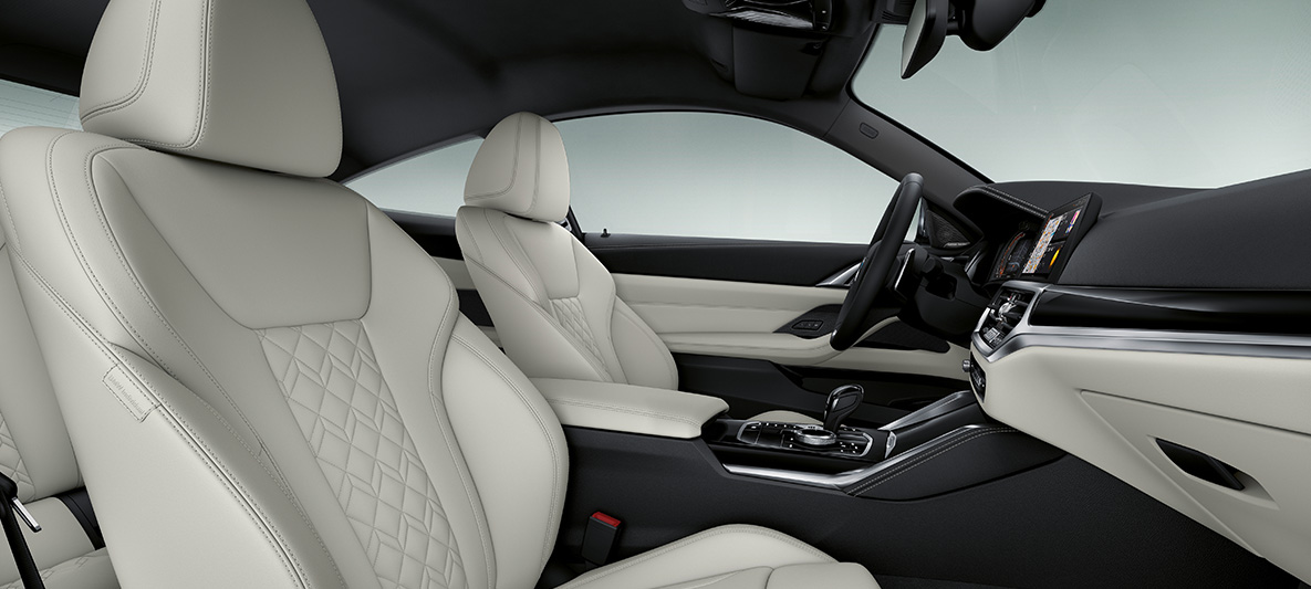 Обробка шкірою 'Merino' кольору слонової кістки BMW 4 серії Coupé Individual G22 2020 салон BMW Individual розширена шкіряна обробка 'Merino' кольору слонової кістки, BMW 4 серії Coupé Individual G22 2020 кабіна салону