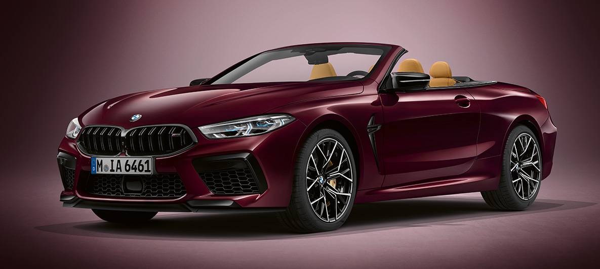 BMW Individual M8 Кабріолет в BMW Individual Ametrine металік. BMW Individual M8 Кабріолет в BMW Individual Ametrine металік, вид спереду з поворотом в три чверті.
