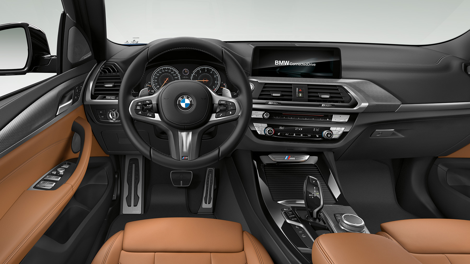 BMW X3 M40i і BMW X3 M40d, кабіна. BMW X3 M40i і BMW X3 M40d, салон, кабіна зі шкіряним рульовим колесом M і сидіннями M Sport.