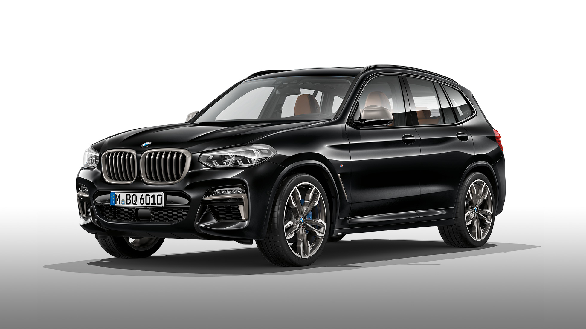 BMW X3 M40i та BMW X3 M40d, вид збоку. BMW X3 M40i та BMW X3 M40d у Black Sapphire металік, екстер’єр, вид збоку.
