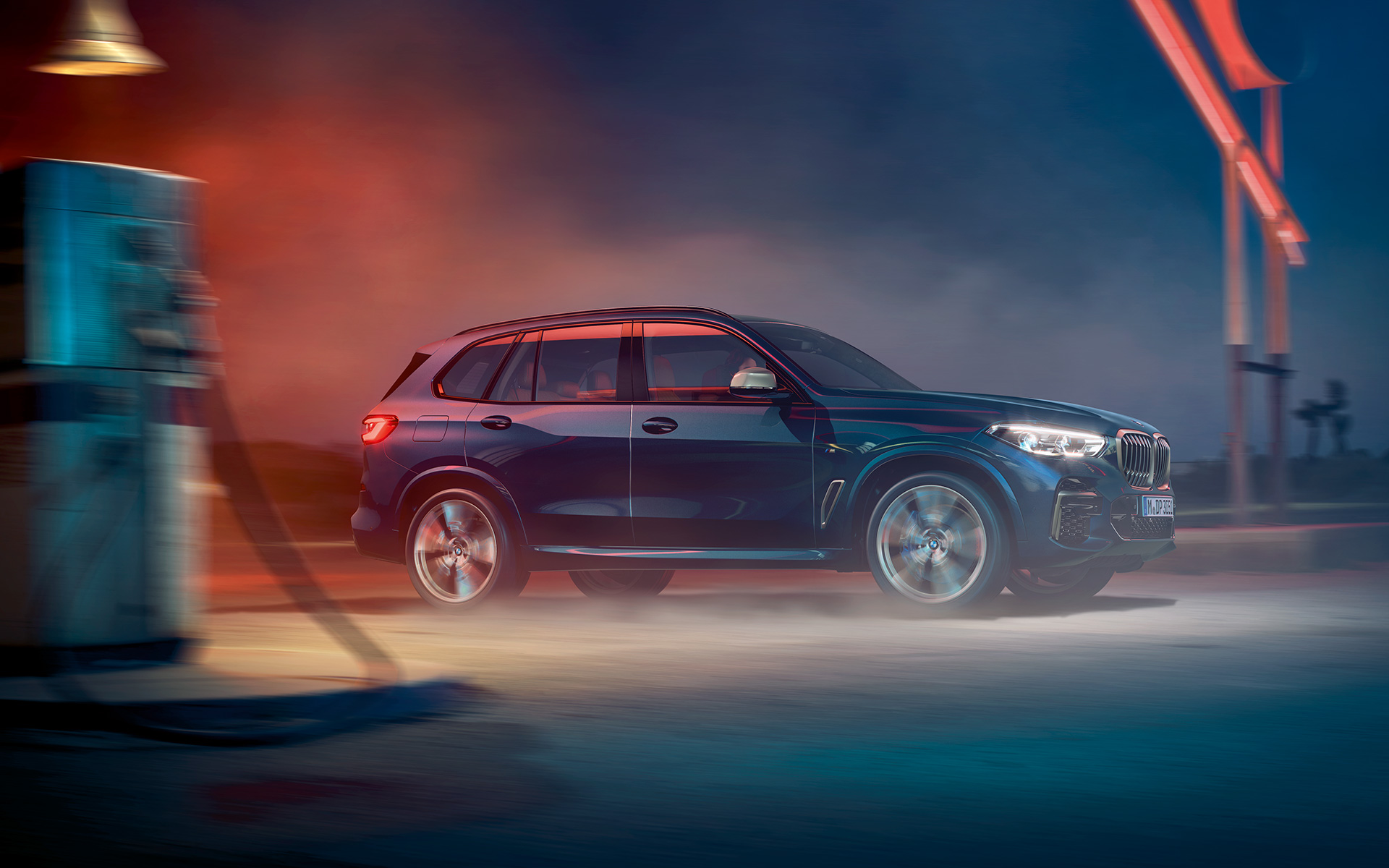 BMW X5 M50i та M50d G05 2018 SUV з легкосплавними дисками М light Carbon black металік вид збоку