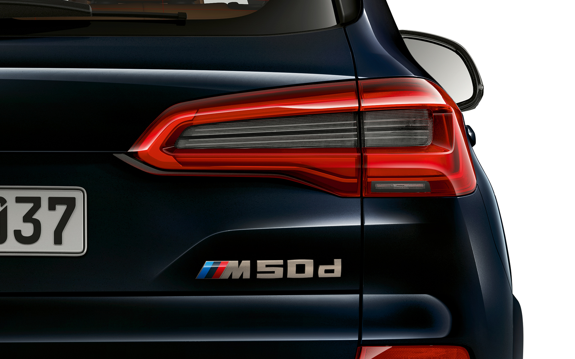 Літерне позначення на задній частині BMW X5 M50d Детальний знімок позначення моделі для BMW X5 M50d