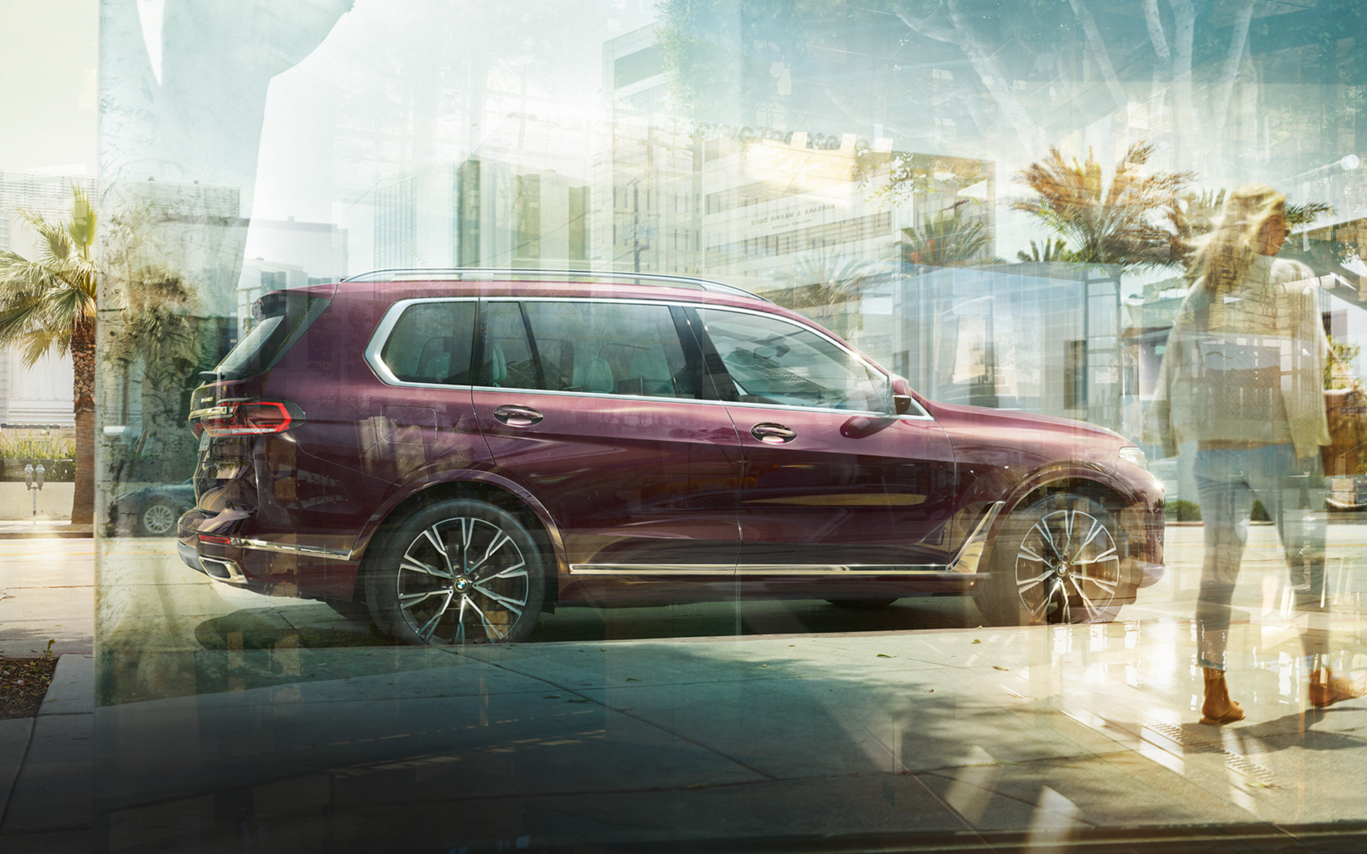 BMW X7 Individual xDrive40i G07 2018 ametrin metallic, вид збоку в місті BMW X7 Individual xDrive40i G07 2018 ametrin metallic, вид збоку в місті
