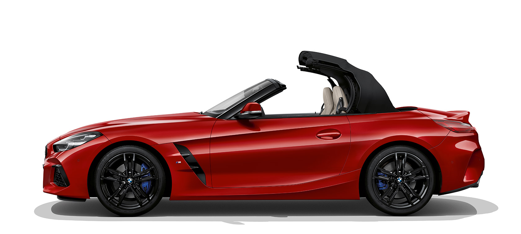 Боковой снимок BMW Z4 Roadster Боковой снимок BMW Z4 Roadster с открытой крышей